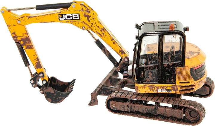 Britains 1:32 JCB Muddy Midi Excavator 86C-2, sammelbares Traktorspielzeug für den Bauernhof, Traktorspielzeug kompatibel mit Bauernhoftieren und Spielzeug im Maßstab 1:32, geeignet für Sammler und Kinder ab 3 Jahren