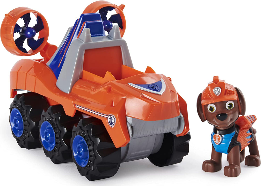 PAW Patrol, Dino Rescue Zumas Deluxe Rev Up Vehicle mit geheimnisvoller Dinosaurierfigur